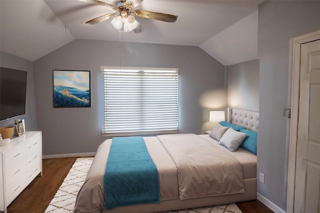 332 NW County Road 2005, Corsicana, TX 75110 - bedroom featuring vaulted ceiling, dark wood finished floors, baseboards, and a ceiling fan