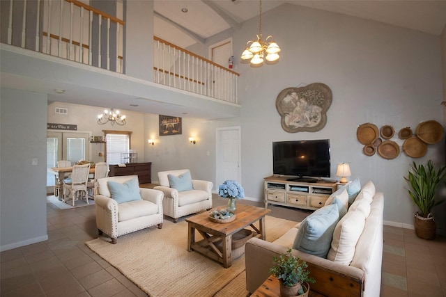 332 NW County Road 2005, Corsicana, TX 75110 - living room with a chandelier, high vaulted ceiling, tile patterned floors, and baseboards
