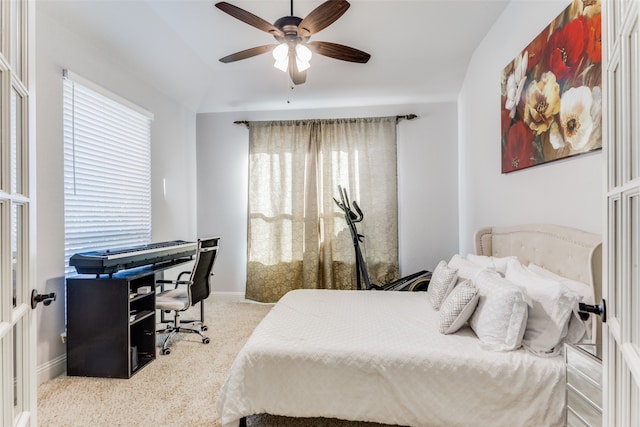 bedroom featuring ceiling fan and light colored carpet