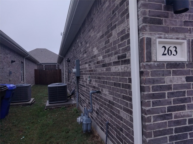 view of side of property featuring cooling unit