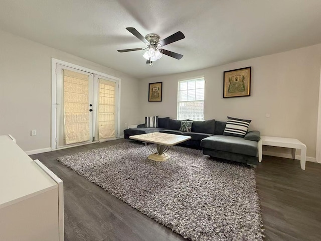 2925 Janet Dr, Wylie, TX 75098 - living area featuring dark wood-style flooring, ceiling fan, baseboards, and french doors