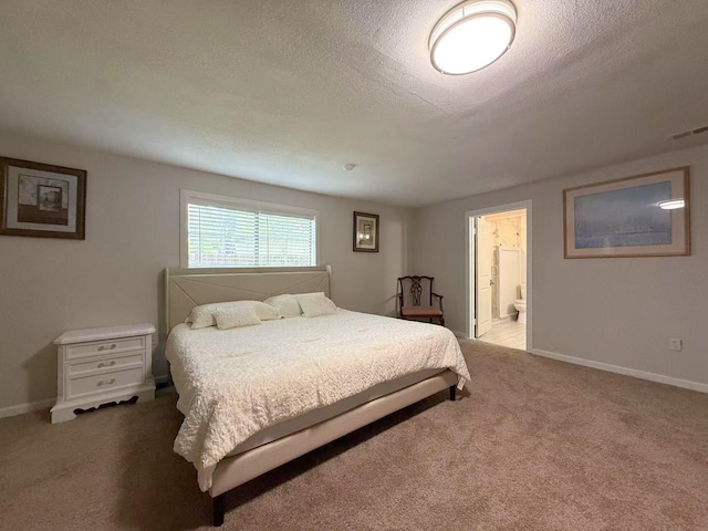 2925 Janet Dr, Wylie, TX 75098 - carpeted bedroom featuring a textured ceiling, baseboards, and ensuite bathroom