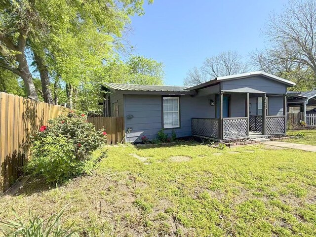 2925 Janet Dr, Wylie, TX 75098 - back of property with covered porch and metal roof