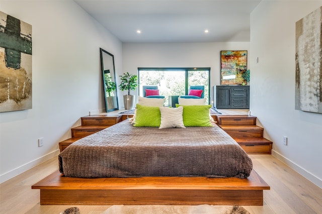 bedroom featuring light hardwood / wood-style floors