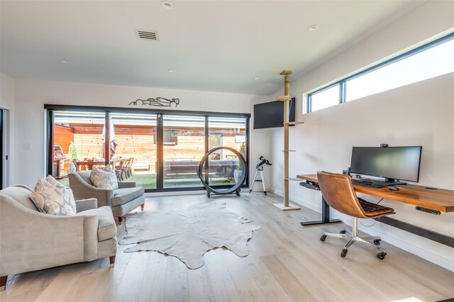 office space featuring light hardwood / wood-style floors