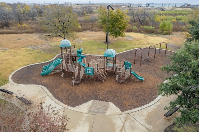 view of jungle gym with a yard