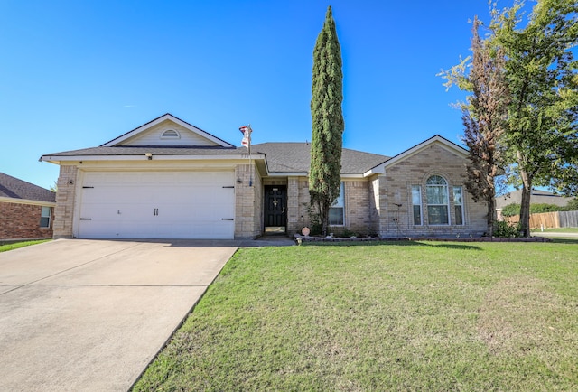 ranch-style house with a front yard and a garage