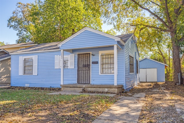 bungalow with a storage shed