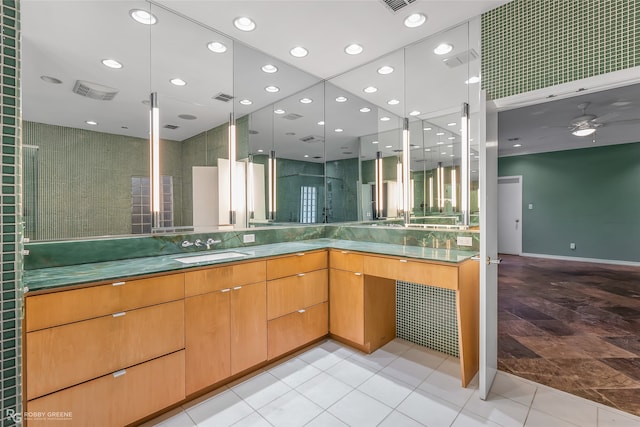 bathroom featuring vanity and ceiling fan