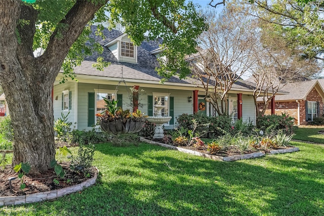 view of front of home with a front lawn