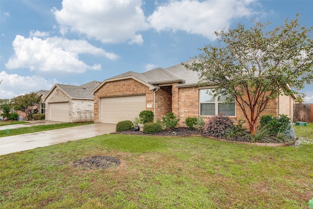 ranch-style house featuring a front yard and a garage