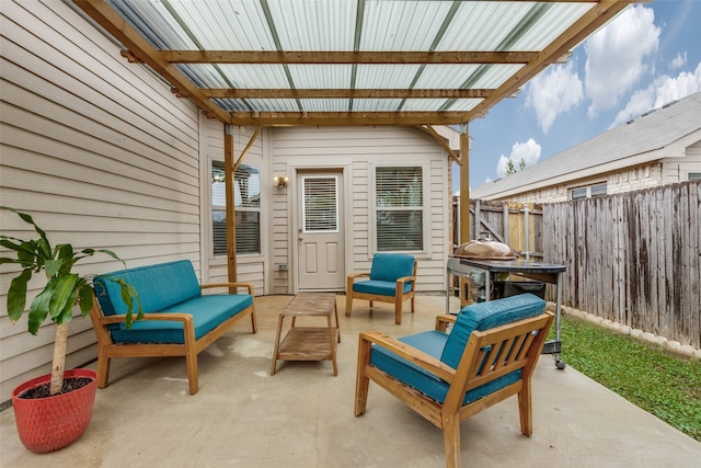 view of patio with a pergola and an outdoor living space