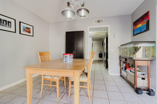 view of tiled dining space