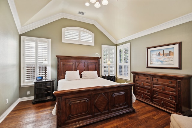 bedroom featuring crown molding, dark hardwood / wood-style flooring, and lofted ceiling