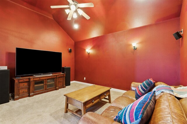 cinema room featuring carpet floors, ceiling fan, and lofted ceiling