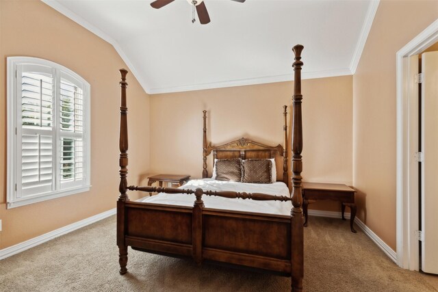 bedroom featuring carpet, vaulted ceiling, ceiling fan, and ornamental molding