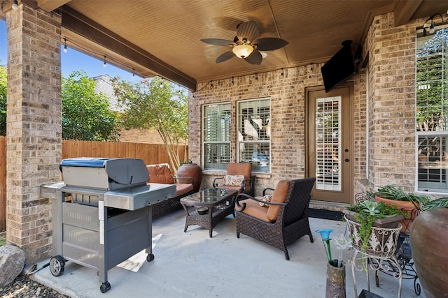 view of patio / terrace featuring ceiling fan and an outdoor hangout area