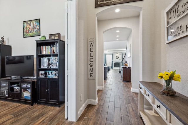 corridor featuring dark hardwood / wood-style flooring