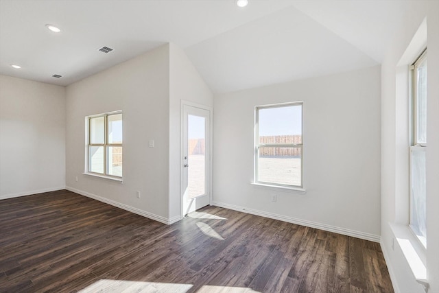 2511 Ridgecrest Ln, Sherman, TX 75092 - unfurnished room featuring dark wood-type flooring, lofted ceiling, baseboards, and recessed lighting