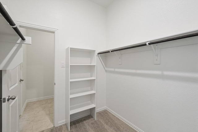 2511 Ridgecrest Ln, Sherman, TX 75092 - walk in closet with carpet floors