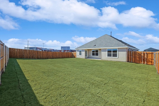 2511 Ridgecrest Ln, Sherman, TX 75092 - back of house with roof with shingles