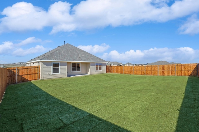 2511 Ridgecrest Ln, Sherman, TX 75092 - back of house with roof with shingles