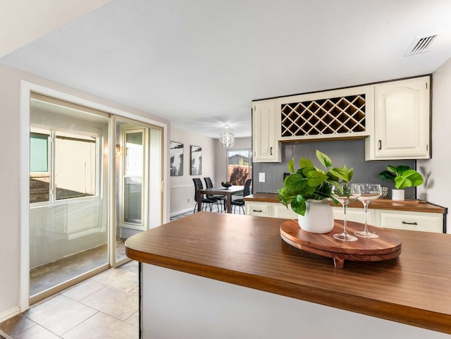 tiled dining space with bar area