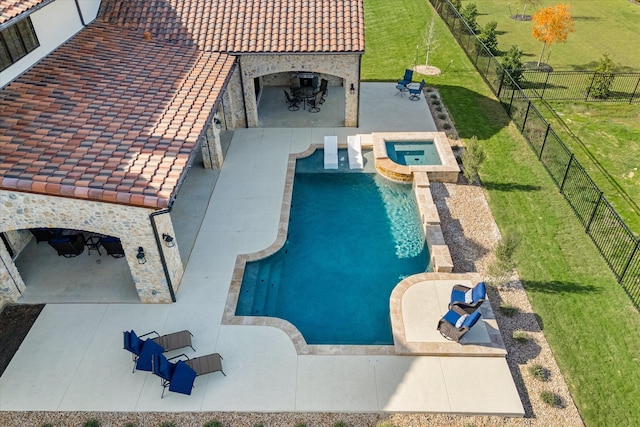 view of swimming pool with ceiling fan and a patio area