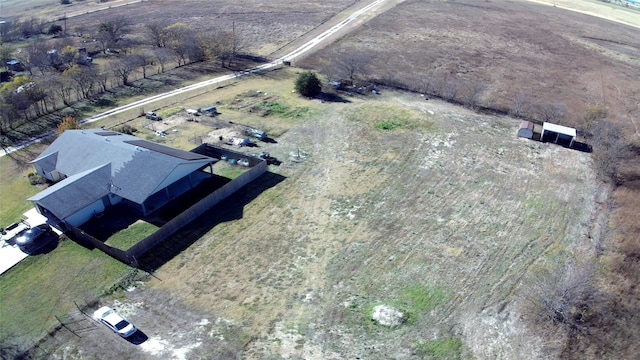 birds eye view of property featuring a rural view