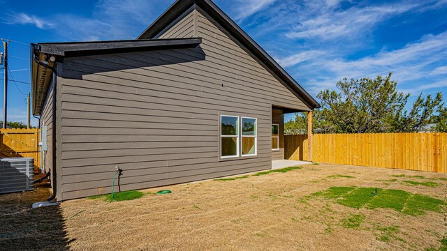 view of home's exterior featuring central AC