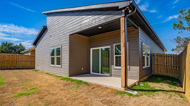 back of house featuring a patio area