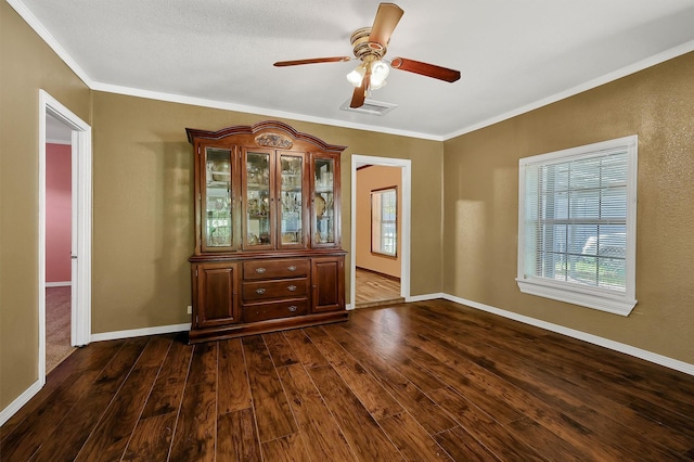 205 N Bean St, Howe, TX 75459 - spare room with crown molding, dark wood-style floors, baseboards, and ceiling fan