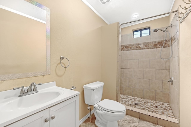 205 N Bean St, Howe, TX 75459 - bathroom with toilet, a tile shower, vanity, tile patterned floors, and baseboards
