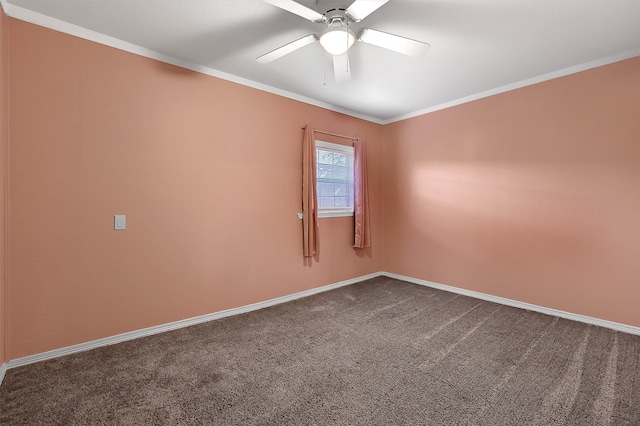 carpeted spare room featuring ceiling fan and ornamental molding