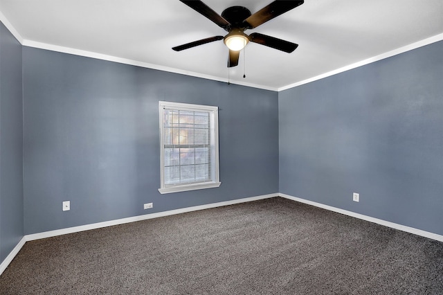 spare room with ceiling fan, crown molding, and carpet floors