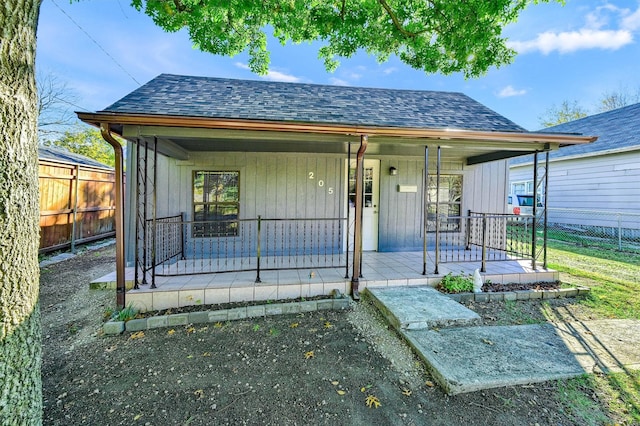 205 N Bean St, Howe, TX 75459 - view of front of house featuring covered porch and roof with shingles