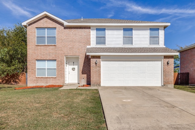 view of front of house featuring a garage and a front lawn