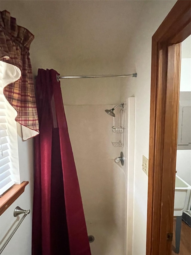 full bathroom featuring a stall shower