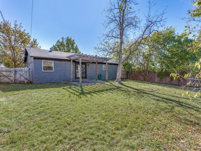 back of property featuring a pergola, a lawn, and a patio