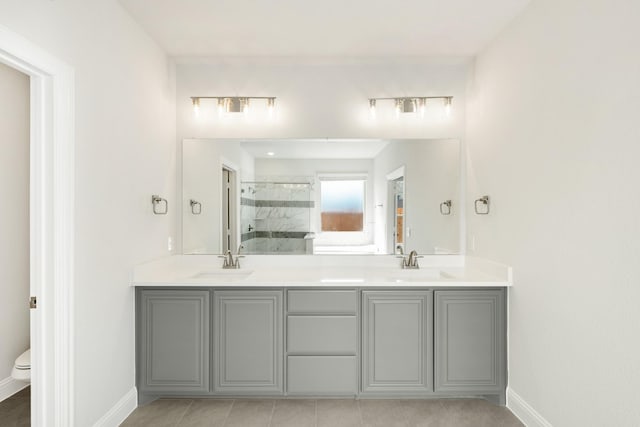 116 Harlan Ct, Aledo, TX 76008 - bathroom with a stall shower, baseboards, double vanity, toilet, and tile patterned flooring