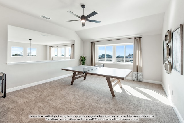 game room with light carpet, ceiling fan, and lofted ceiling