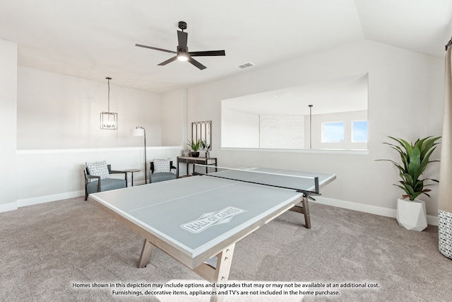 recreation room with light colored carpet, ceiling fan, and lofted ceiling