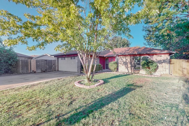 single story home with a front yard and a garage