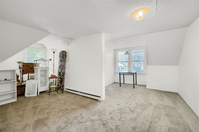 bonus room featuring a textured ceiling, carpet, vaulted ceiling, and a baseboard heating unit