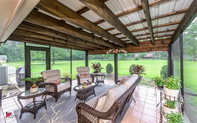 sunroom / solarium with beam ceiling