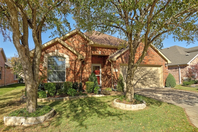 view of front of home featuring a front lawn and a garage