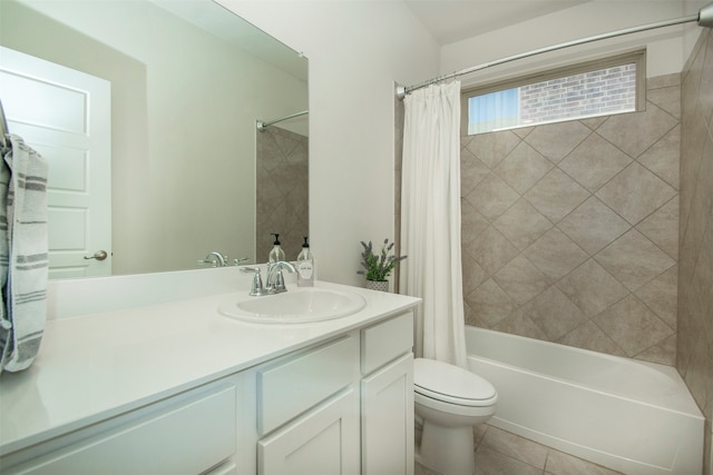 full bathroom featuring tile patterned flooring, shower / tub combo, vanity, and toilet