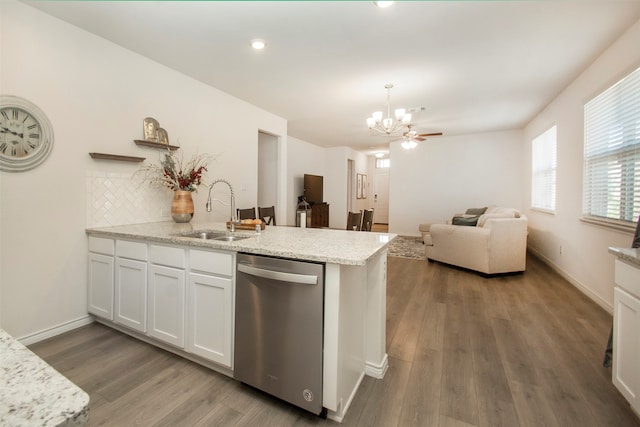 kitchen featuring dishwasher, white cabinets, dark wood-type flooring, and sink