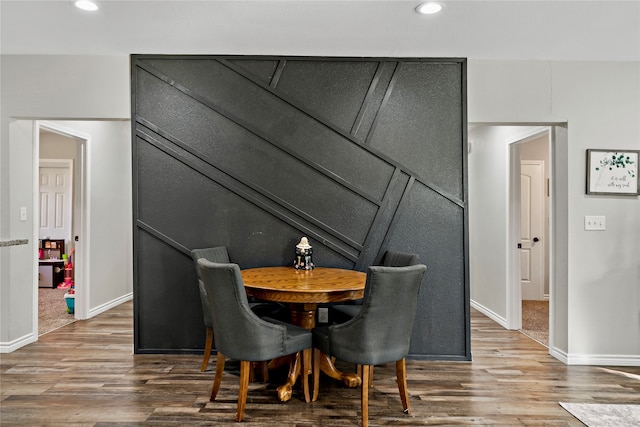 dining room with hardwood / wood-style floors