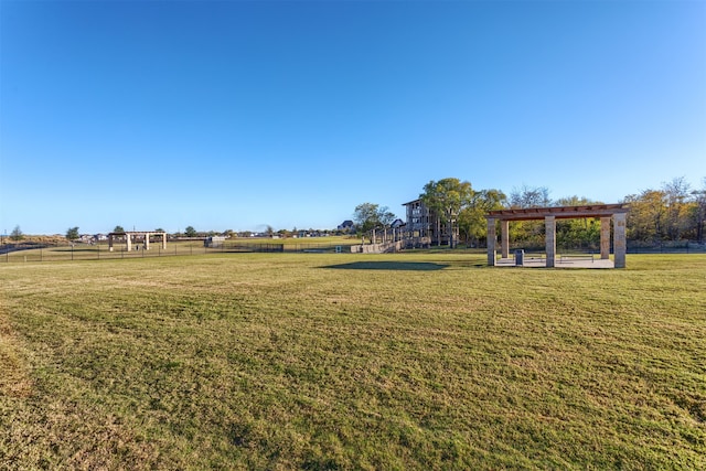 view of yard with a rural view